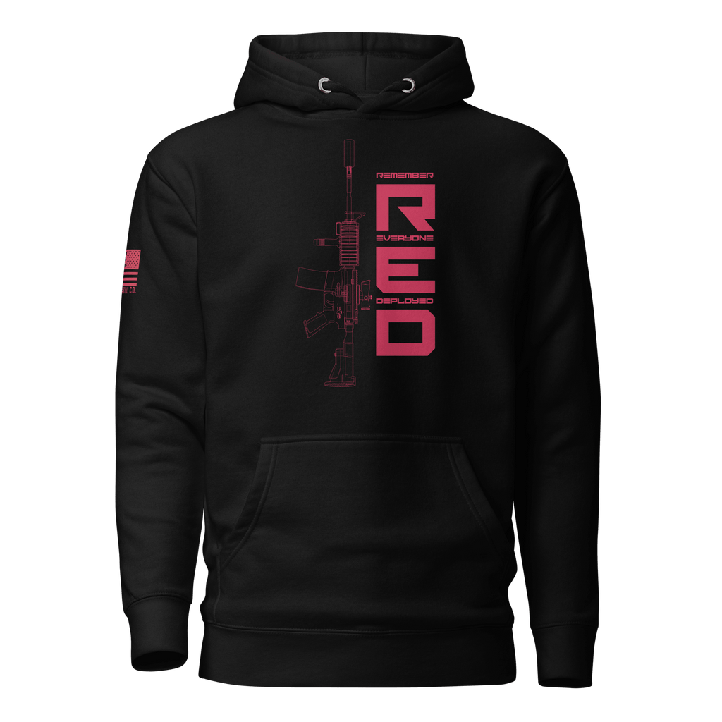 Black hoodie with pink "RED" graphic, rifle line art, and American flag on the sleeve.