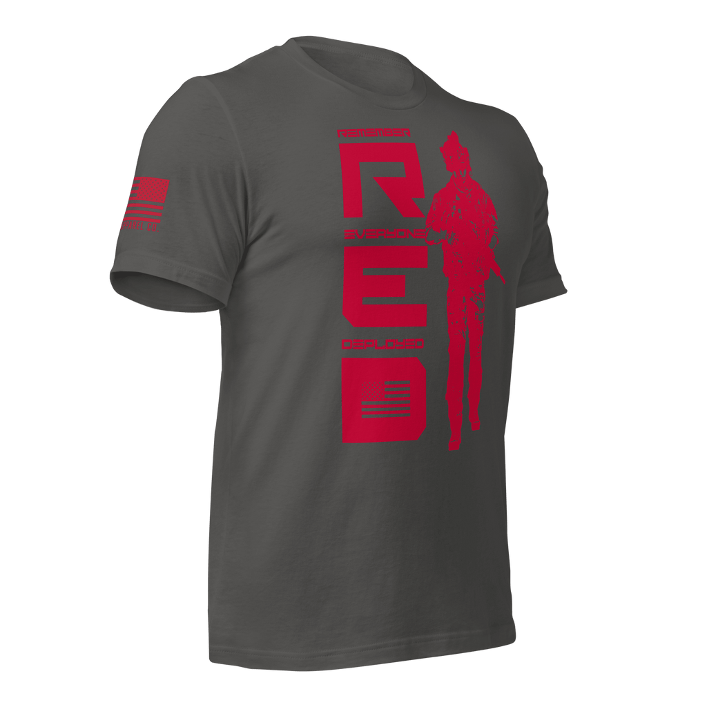 Asphalt gray t-shirt, angled left, featuring red R.E.D. text, soldier silhouette, and red American flag on the sleeve.