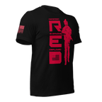 Black t-shirt, angled left, featuring red R.E.D. text, soldier silhouette, and red American flag on the sleeve.