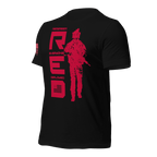 Black t-shirt, angled right, featuring red R.E.D. text, soldier silhouette, and red American flag on the sleeve.