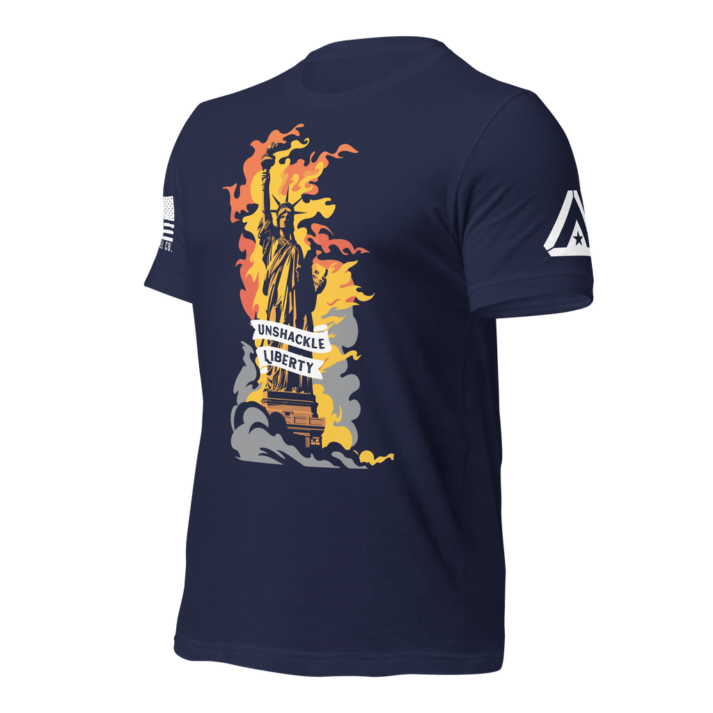 Navy t-shirt angled right featuring a flaming Statue of Liberty and a white American flag on the sleeve.