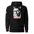 Black hoodie featuring a Ronald Reagan portrait graphic with "GREAT" text and an American flag sleeve patch.