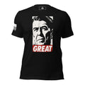 Black t-shirt featuring a stylized portrait graphic of Ronald Reagan above red text reading "GREAT" with a US flag patch.