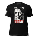 Black t-shirt featuring a stylized portrait graphic of Ronald Reagan above red text reading "GREAT" with a US flag patch.