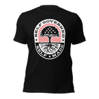Black t-shirt, front view, circular "Self Governed Self Made" graphic featuring a tree with stars and red stripes.