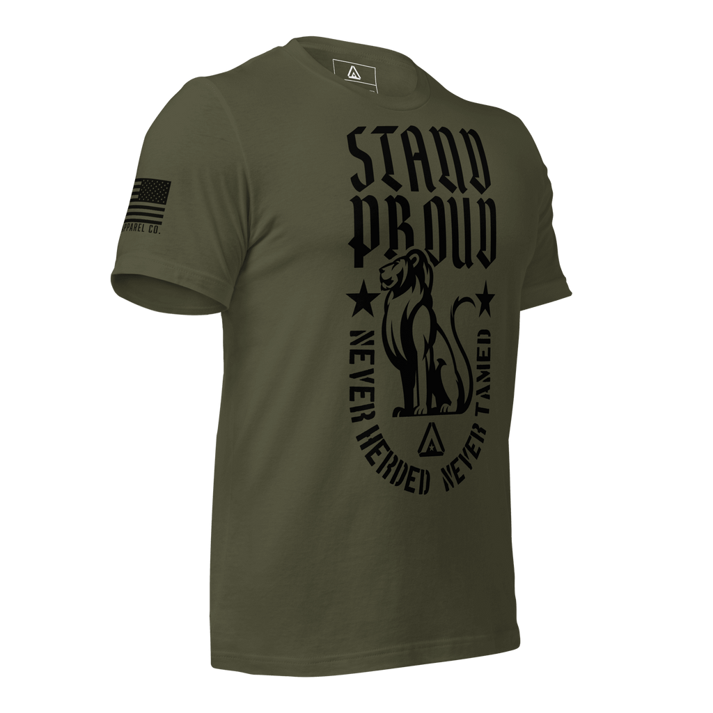 Green shirt angled left, STAND PROUD lion graphic, NEVER HERDED text, DIA logo, and American flag on sleeve.