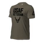 Army green t-shirt, three-quarter view angled right, featuring a black "USAF VETERAN" graphic and a DIA logo on the sleeve.