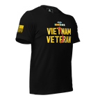 Black Army Vietnam Veteran t-shirt, angled left, featuring a yellow American flag on the sleeve.