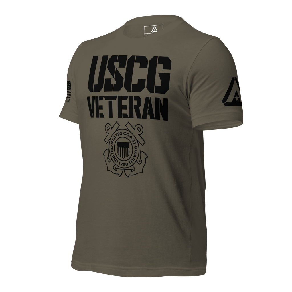 Dark army green t-shirt, angled toward the right, featuring black "USCG VETERAN" text and emblem, and DIA logo