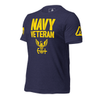 Navy t-shirt angled right, featuring yellow "NAVY VETERAN" text, eagle emblem, and DIA logo on the right sleeve.