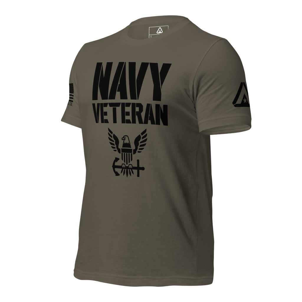 Army green t-shirt angled right, featuring black "NAVY VETERAN" text, eagle emblem, and DIA logo on the left sleeve.