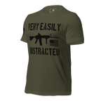 Army green shirt angled right featuring a black "VERY EASILY DISTRACTED" rifle graphic and a black American flag.