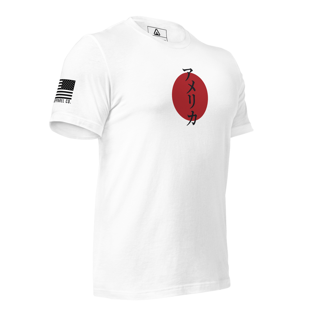 White t-shirt angled left featuring a red circle with Japanese text and a black American flag on the sleeve.