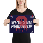 A smiling woman in black holds a large navy "3 Truck" poster with white text and red graphics.