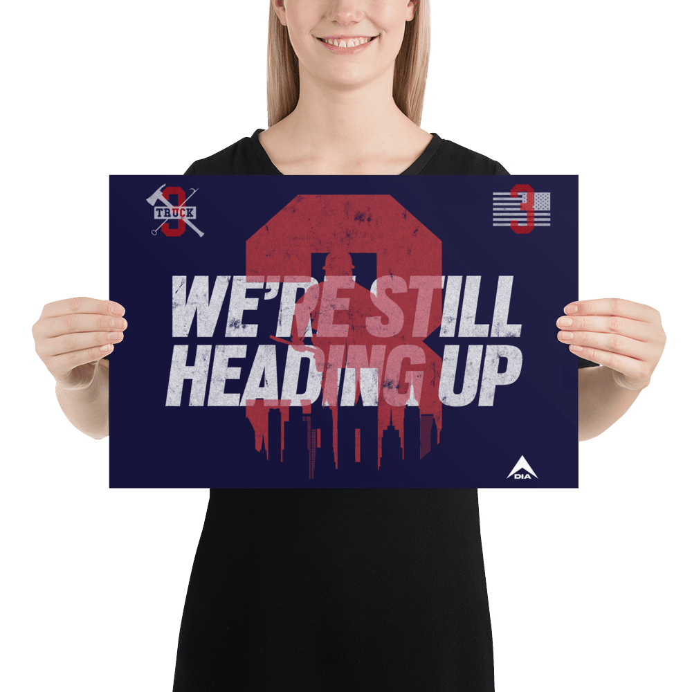 A woman in a black shirt holds a navy "3 Truck" poster with white text, a red graphic, and a white DIA logo.