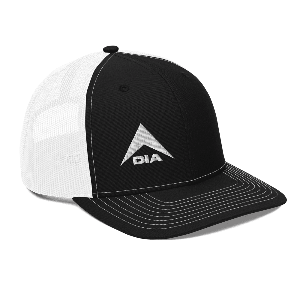 Black trucker hat with white mesh, featuring embroidered white DIA logo, shown from a three-quarter angle.