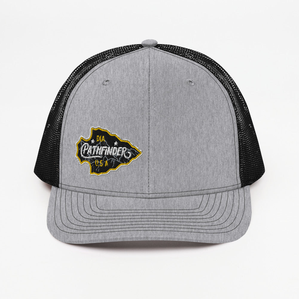 Grey Pathfinder trucker cap, front view, with a black mesh back and arrowhead patch on the front left.
